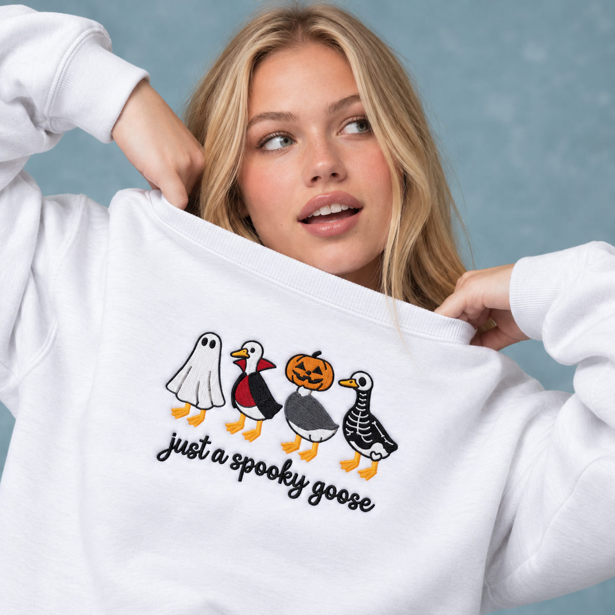 Just a Spooky Goose Four Costumes embroidered sweatshirt — front view