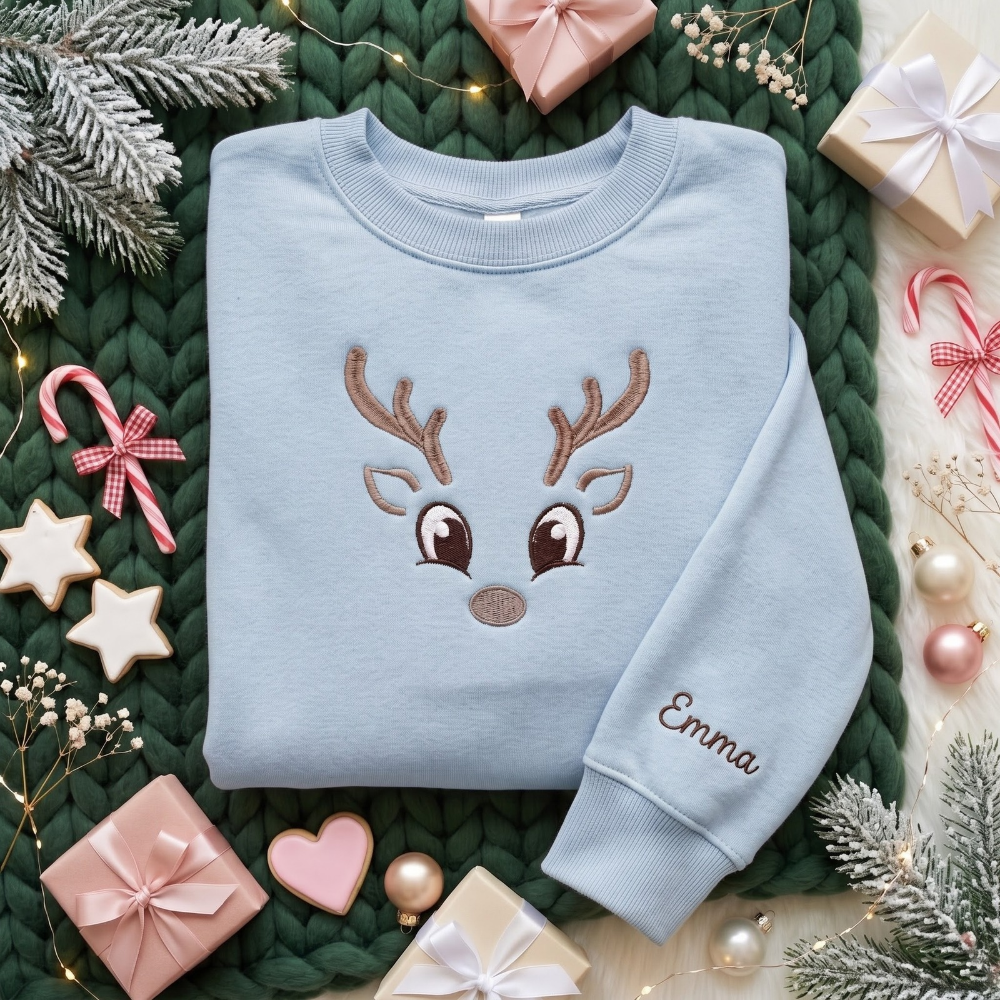 Personalized Cute Reindeer Face Antlers Big Eyes Minimalist Christmas embroidered sweatshirt — front view