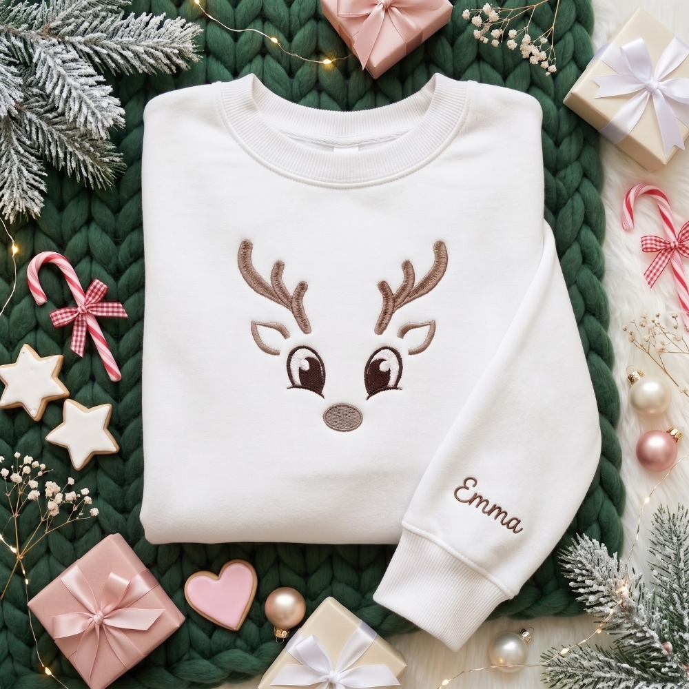 Personalized Cute Reindeer Face Antlers Big Eyes Minimalist Christmas embroidered sweatshirt — front view