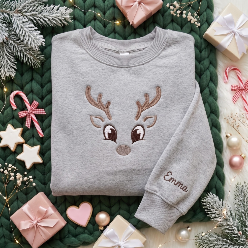Personalized Cute Reindeer Face Antlers Big Eyes Minimalist Christmas embroidered sweatshirt — front view