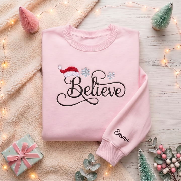 Personalized Believe Script Santa Hat Snowflakes Christmas embroidered sweatshirt — front view