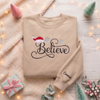 Personalized Believe Script Santa Hat Snowflakes Christmas embroidered sweatshirt — front view