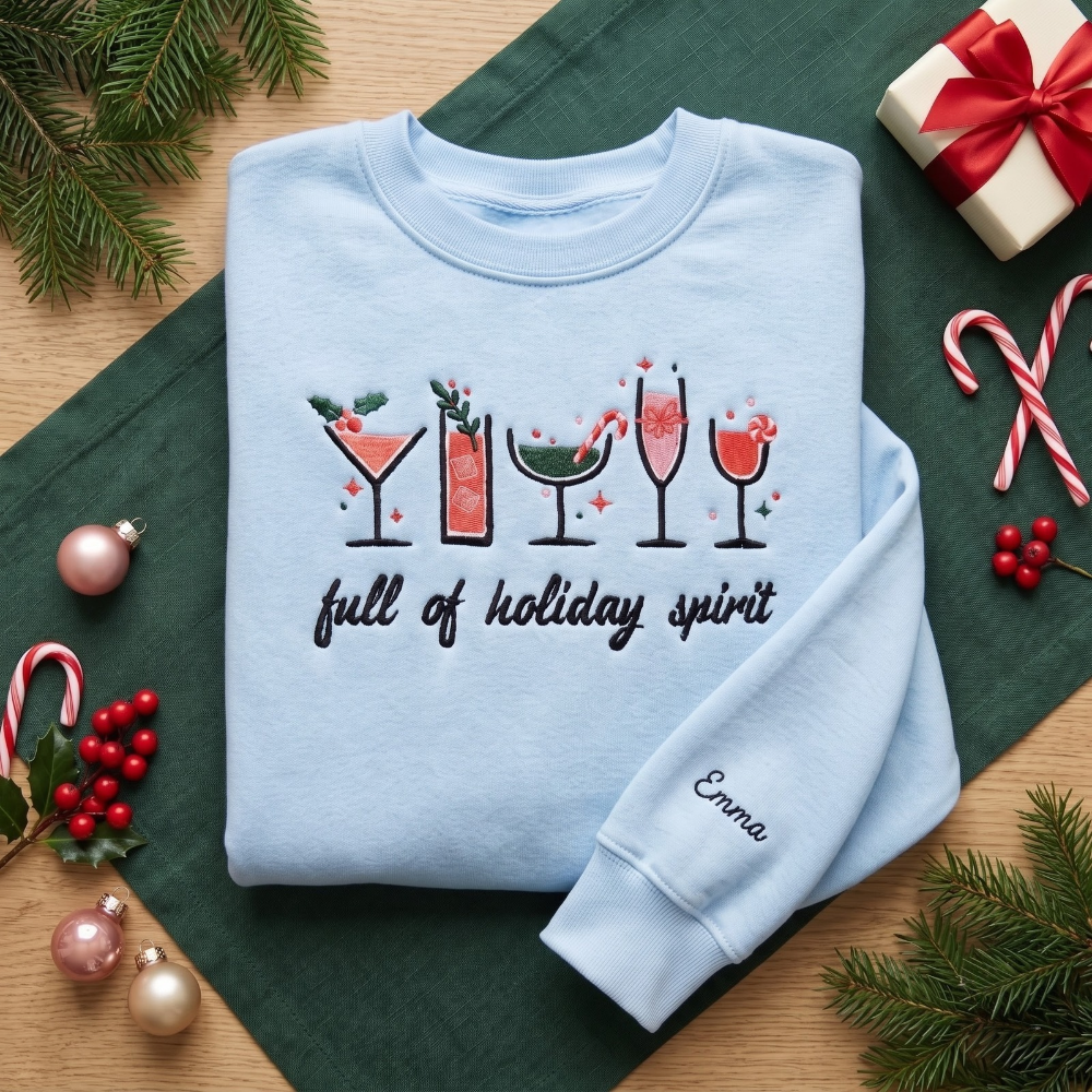 Full of Holiday Spirit Festive Drinks Personalized Christmas embroidered sweatshirt — front view