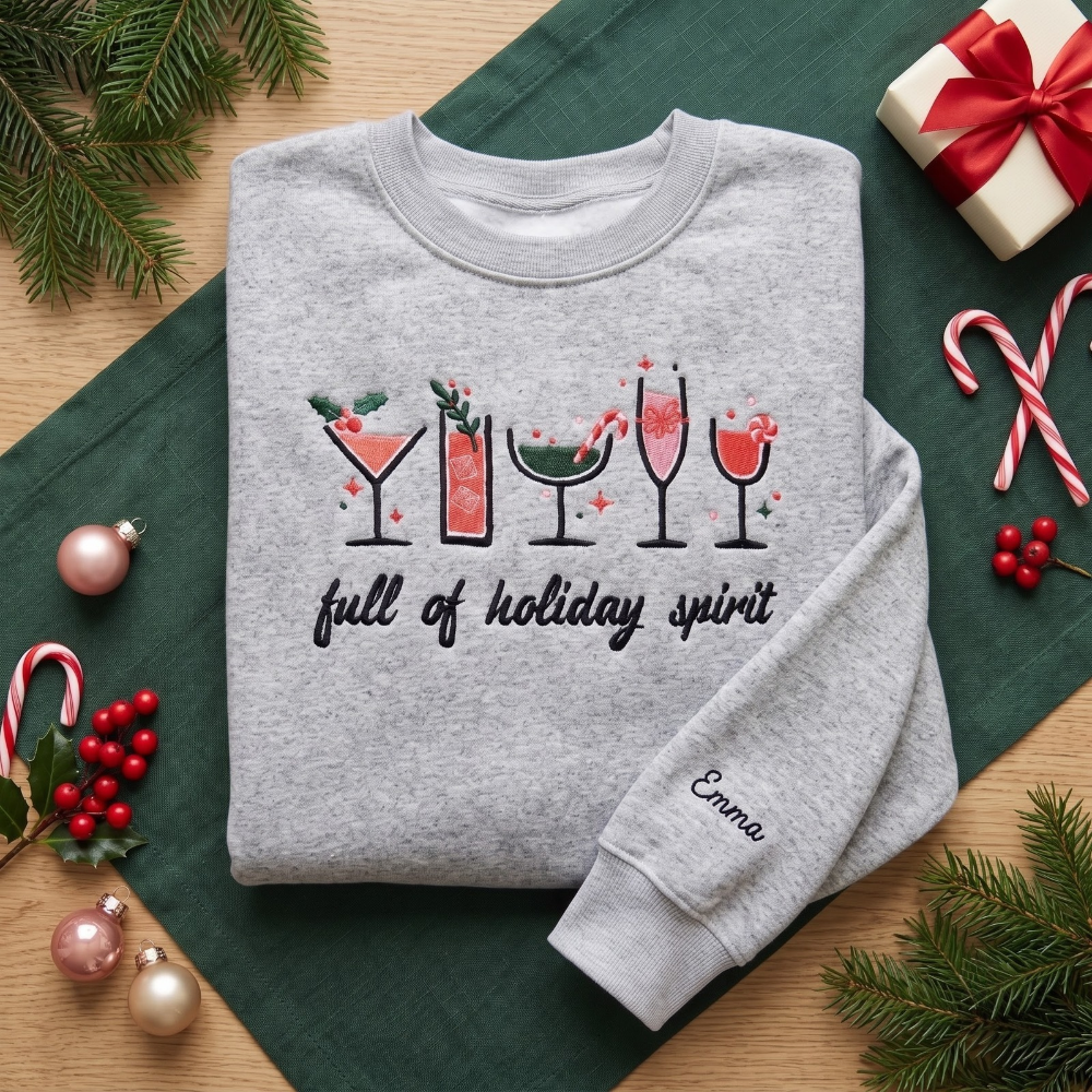 Full of Holiday Spirit Festive Drinks Personalized Christmas embroidered sweatshirt — front view