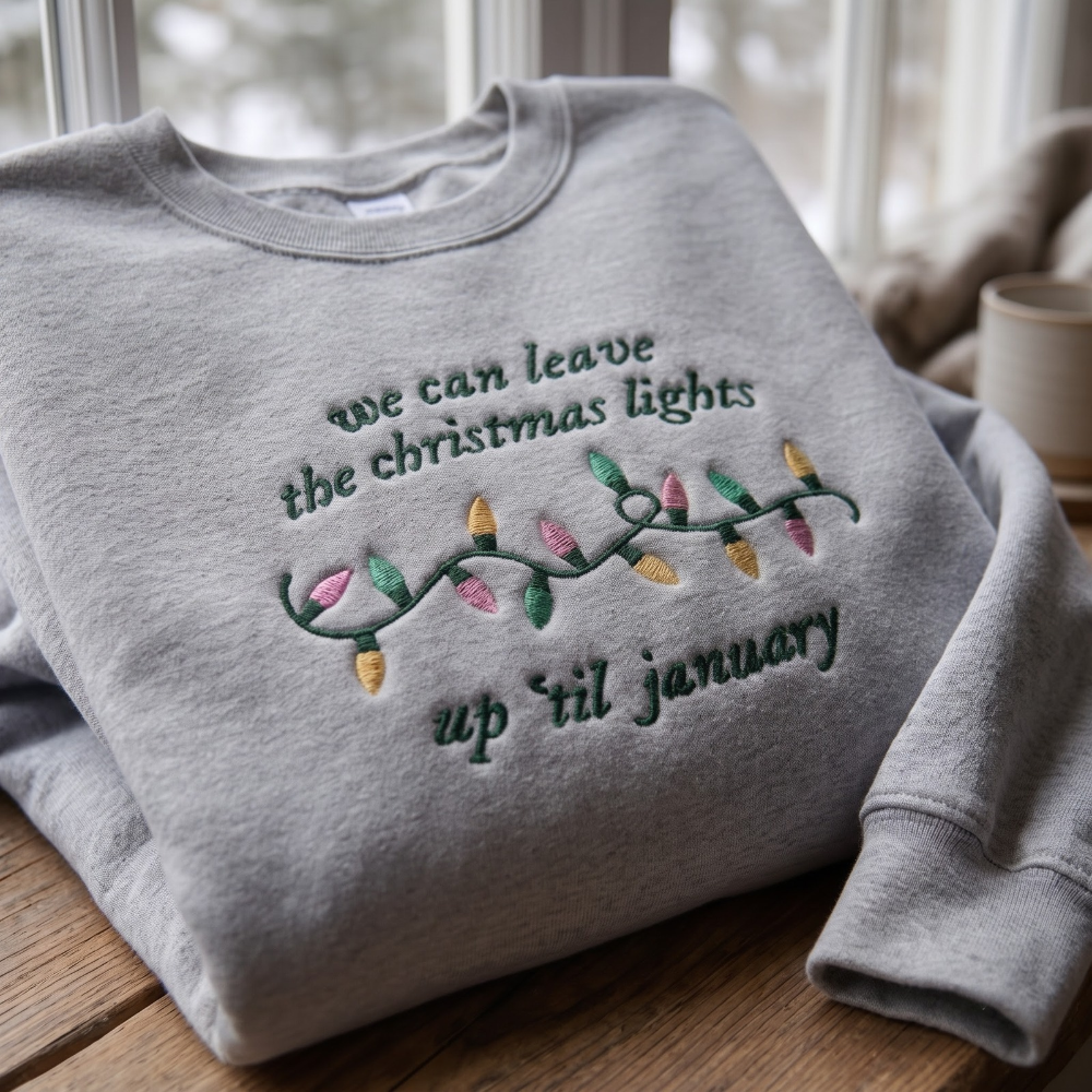 We Can Leave The Christmas Lights Up Til January Lyric Retro Bulbs embroidered sweatshirt — front view