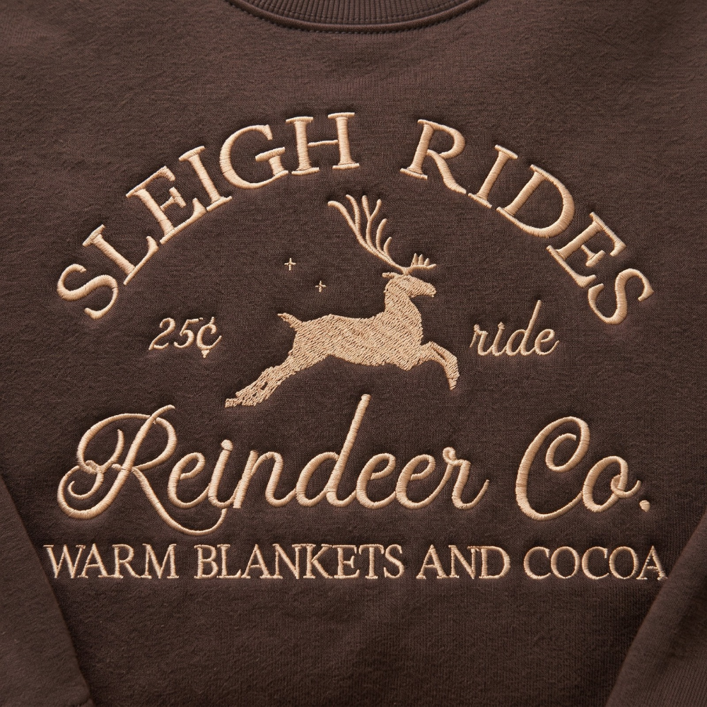Vintage Sleigh Rides Reindeer Co. 25 Cent Ride Warm Blankets Cocoa Christmas embroidered sweatshirt — front view