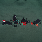 The Personalized Black Cats Christmas Mischief Santa Hat Tangled Lights Ornaments embroidered sweatshirt — front view