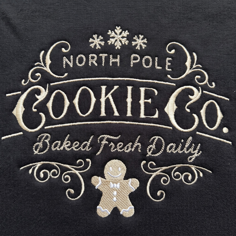 North Pole Cookie Co. Vintage Gingerbread Man Christmas embroidered sweatshirt — front view