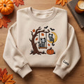 Skeleton Cats Tree Swing Harvest Moon embroidered sweatshirt — front view
