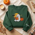 Little Ghost Reading Book Moonlit Pumpkin embroidered sweatshirt — front view