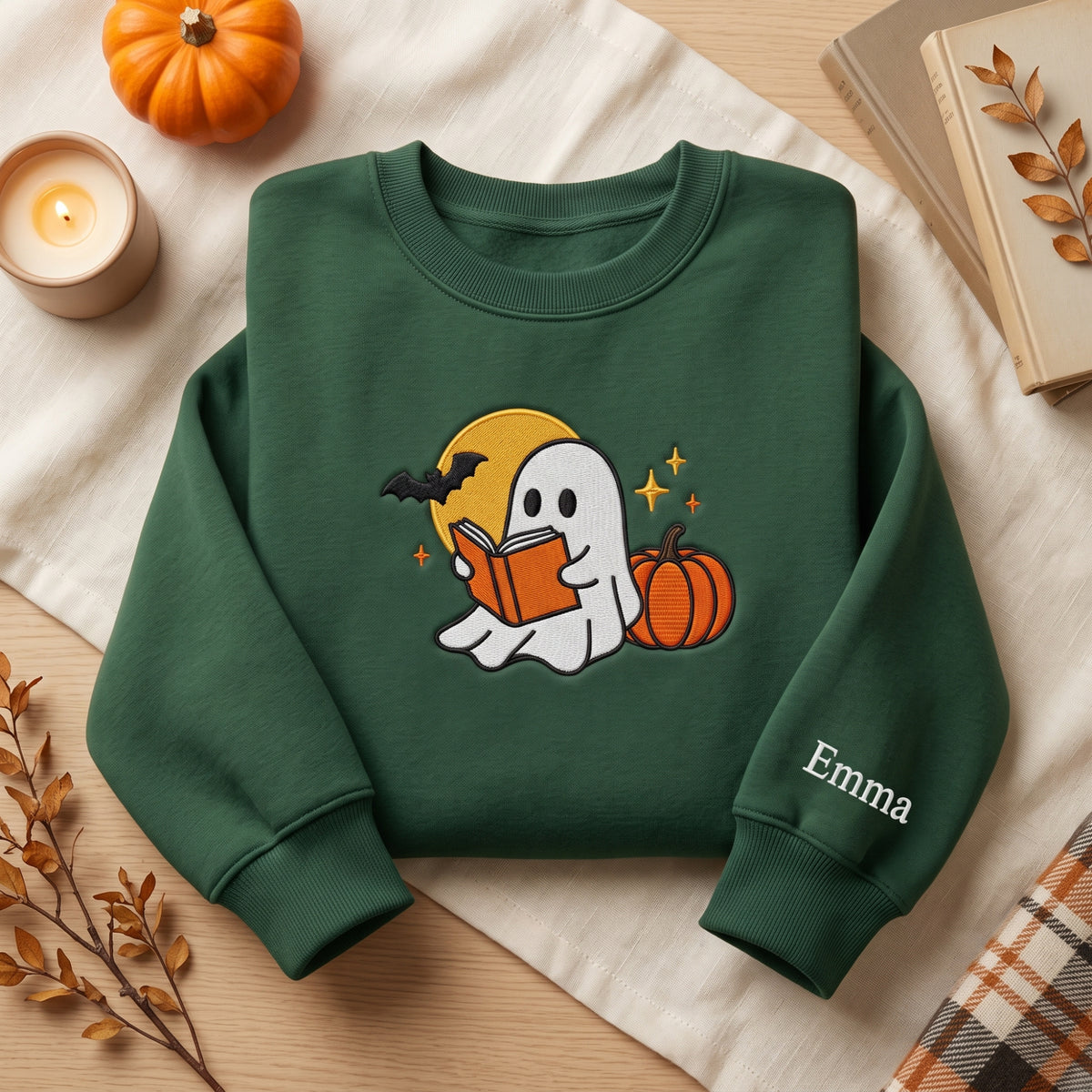 Little Ghost Reading Book Moonlit Pumpkin embroidered sweatshirt — front view