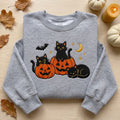Black Cats Jack O Lantern Crescent Moon embroidered sweatshirt in Black — front view