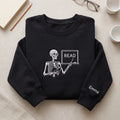 Skeleton Teacher Reading Class Custom Name embroidered sweatshirt — front view