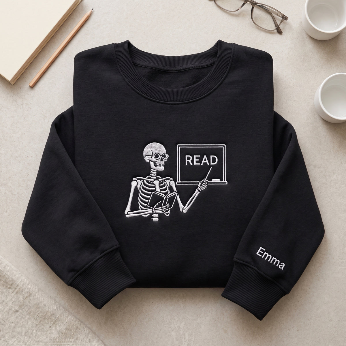 Skeleton Teacher Reading Class Custom Name embroidered sweatshirt — front view