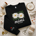 Custom Nickname Daisies EST 2026 embroidered sweatshirt — front view