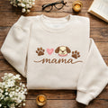 Dog Mama Puppy Face Paw Print Script embroidered sweatshirt — front view