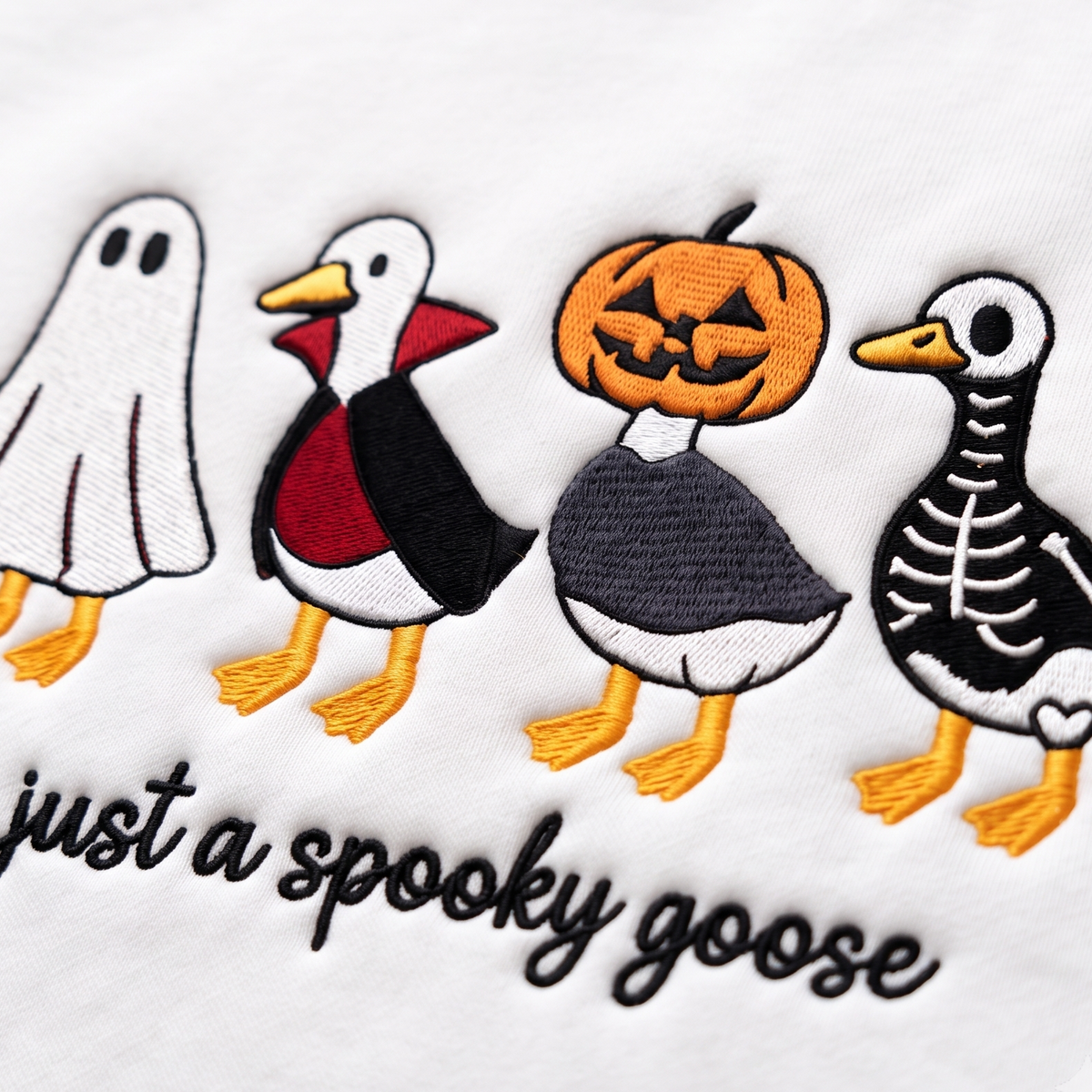 Just a Spooky Goose Four Costumes embroidered sweatshirt — front view