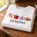 Grandma Coffee Mug Yarn Ball Muffin Tray embroidered sweatshirt — front view