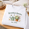 Grandmas Garden Watering Can Flower Pot Bees EST Year embroidered sweatshirt — front view