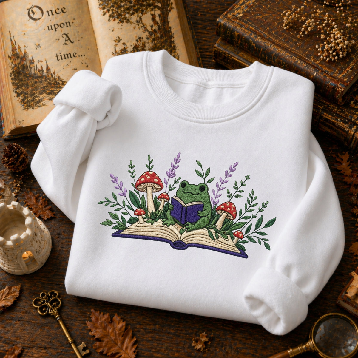 Frog Reading Storybook Toadstool Lavender embroidered sweatshirt — front view