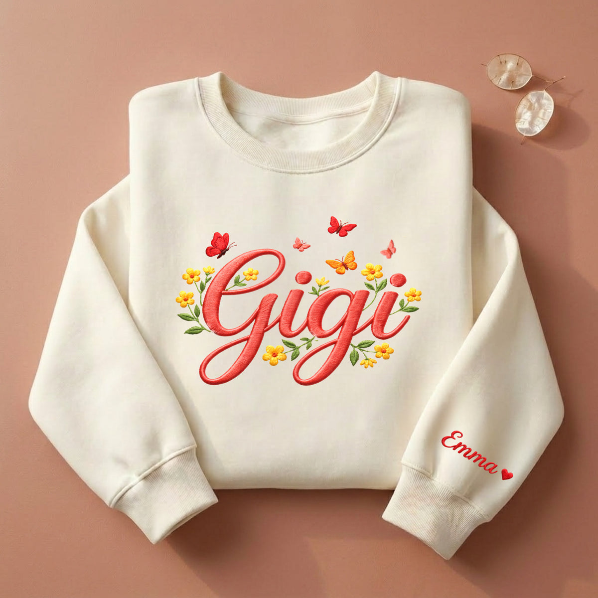 Gigi Custom Grandkid Name Butterfly Wildflower embroidered sweatshirt — front view