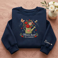 Moms Heart Is a Garden Watering Can Wildflowers embroidered sweatshirt — front view