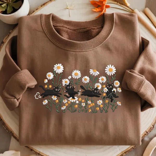 Black Cat Wildflower Daisy Meadow embroidered sweatshirt — front view