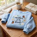 Personalized Mother of the Bride Daisy Butterfly embroidered sweatshirt — front view