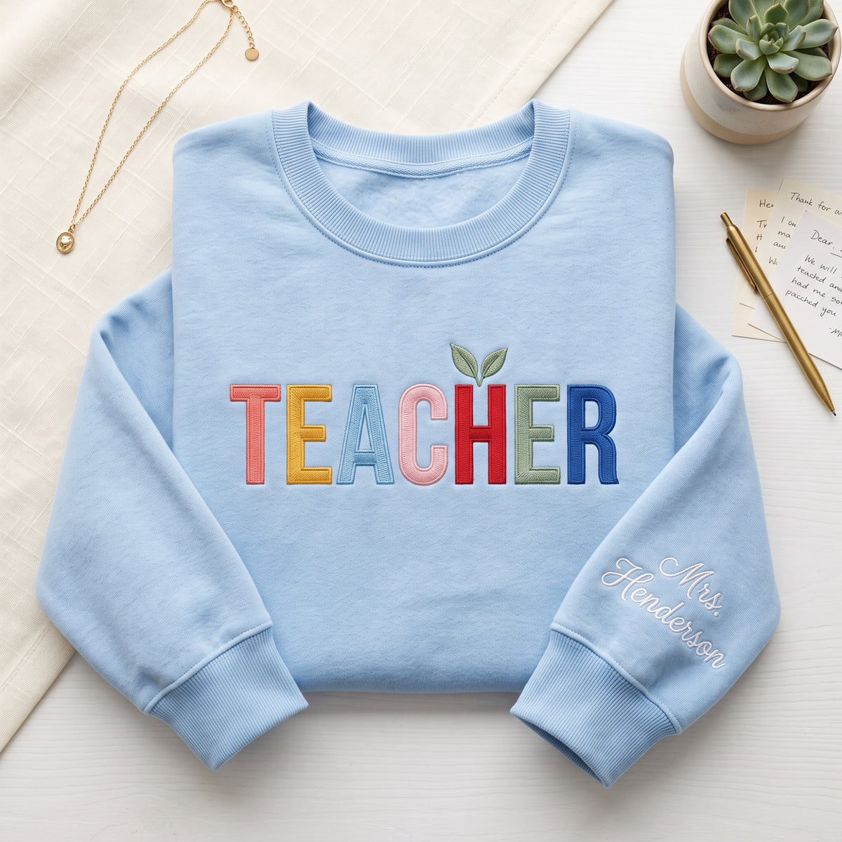 Personalized Teacher Colorful Letters Apple Leaf embroidered sweatshirt — front view