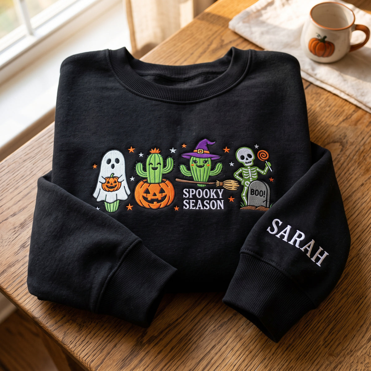 Personalized Spooky Season Cactus embroidered sweatshirt — front view