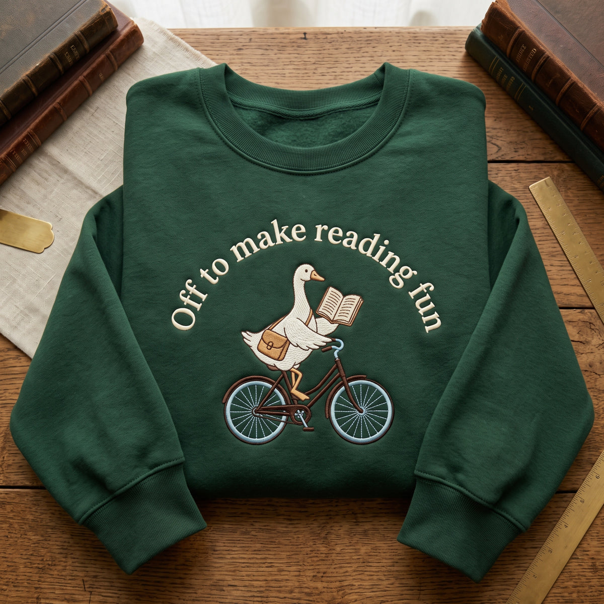 Off to Make Reading Fun Bicycle Goose embroidered sweatshirt — front view