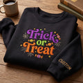 Personalized Trick or Treat Candy Spider Webs embroidered sweatshirt — front view