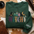 Personalized Witchy Potions Black Cat embroidered sweatshirt in Black — front view