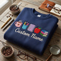 Personalized Teacher Name Coffee Pencils Notebook Apple Books embroidered sweatshirt — front view