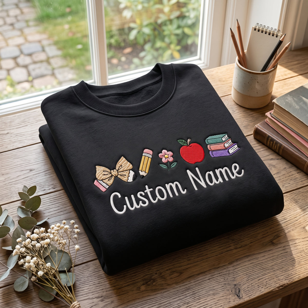 Personalized Teacher Name Coquette Bow Pencil Flower Apple Books embroidered sweatshirt — front view