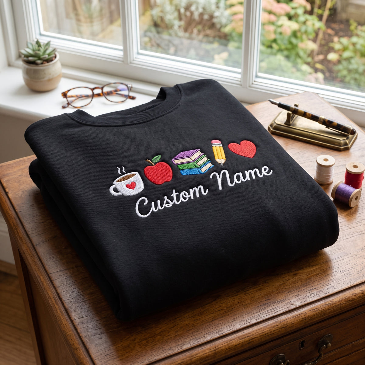 Personalized Teacher Name Coffee Apple Books Pencil Heart embroidered sweatshirt — front view