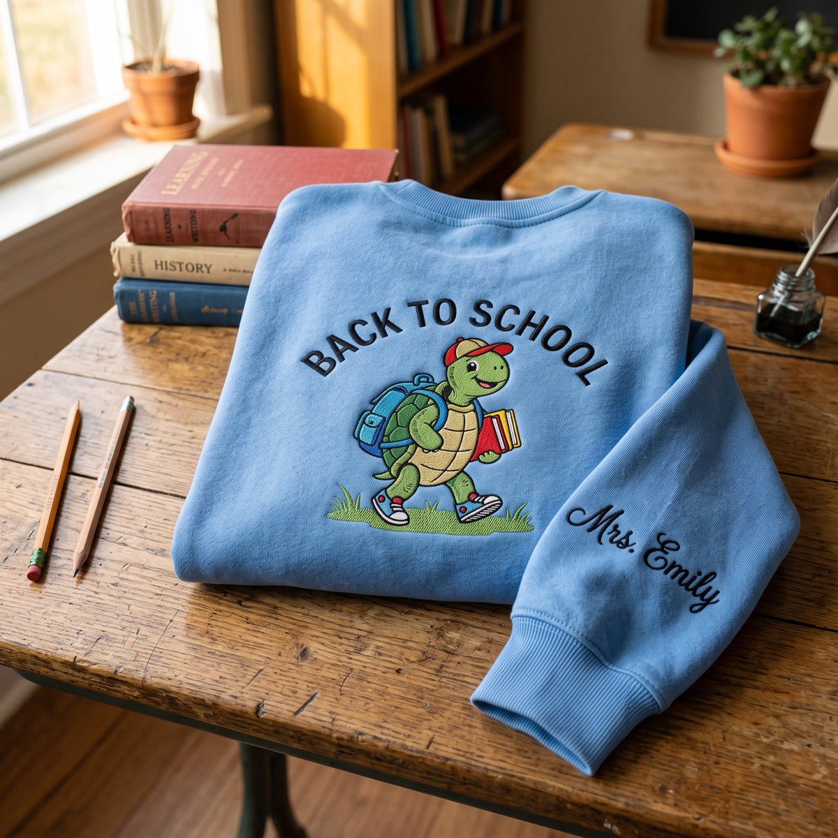Personalized Teacher Name to School Turtle Backpack embroidered sweatshirt — front view