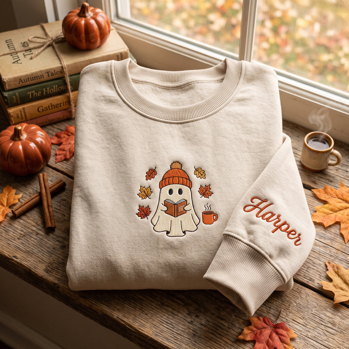 Cozy Ghost Reading Book Beanie Autumn Leaves embroidered sweatshirt — front view