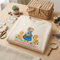 Grandmas Garden Mother Goose Two Ducklings embroidered sweatshirt — front view