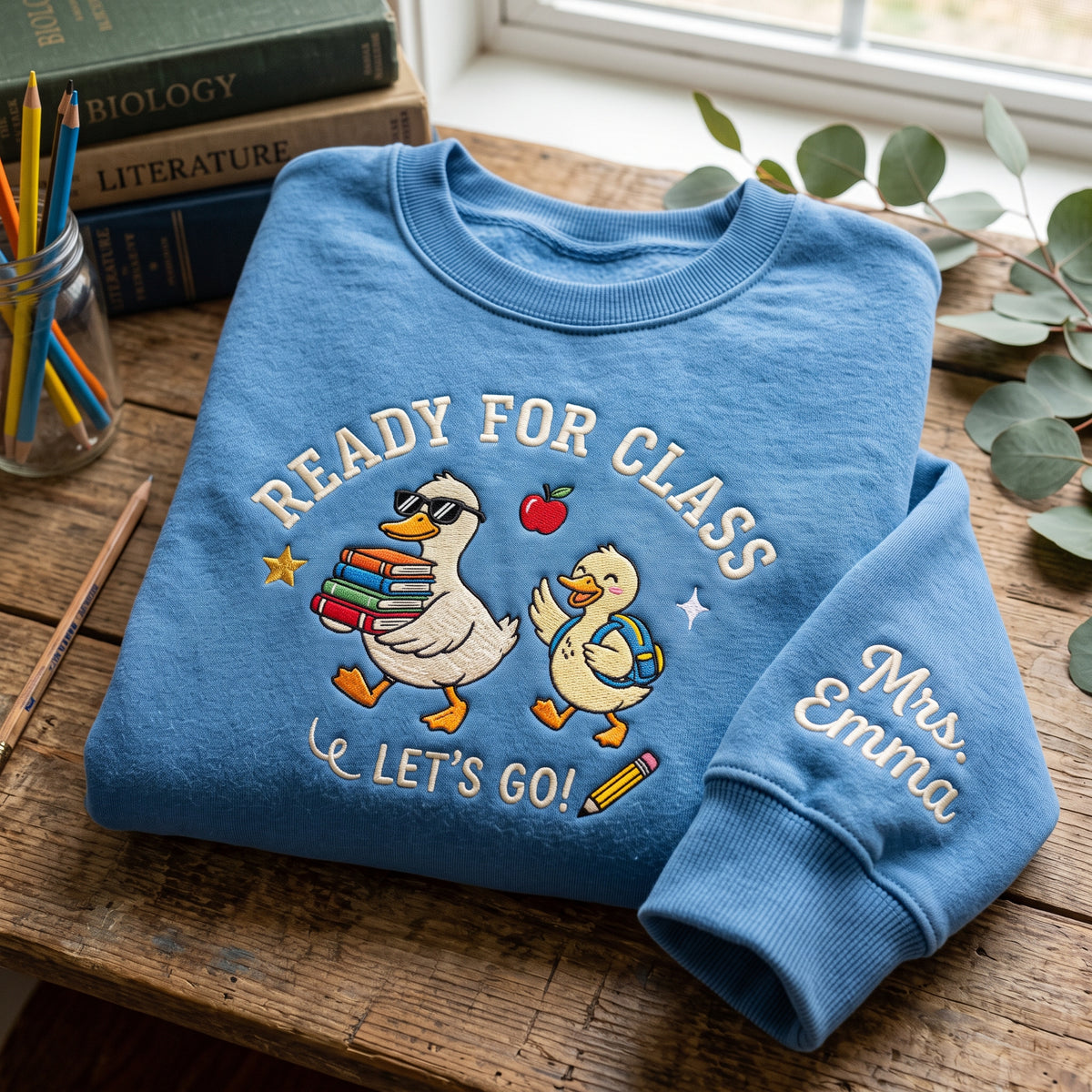 Personalized Teacher Duck and Duckling Book Stack Ready for Class embroidered quarter-zip — front view