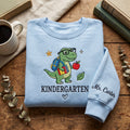 Personalized Kindergarten Teacher Dinosaur Backpack Books Apple embroidered sweatshirt — front view