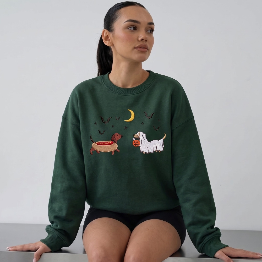 Halloween Dachshund Hot Dog Costume and Ghost Dog Pumpkin Bucket Bats Moon embroidered sweatshirt — front view