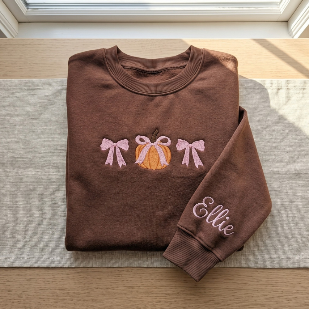 Personalized Fall Pumpkin Pink Coquette Bows Minimalist embroidered sweatshirt — front view