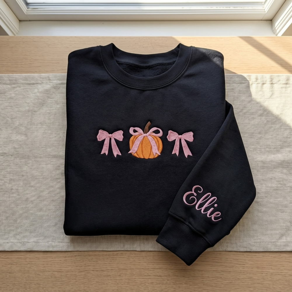 Personalized Fall Pumpkin Pink Coquette Bows Minimalist embroidered sweatshirt — front view
