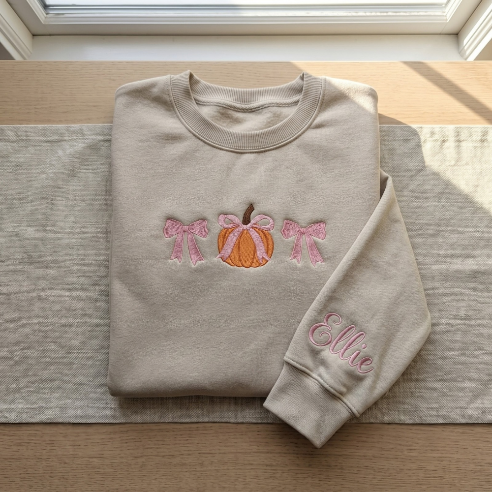 Personalized Fall Pumpkin Pink Coquette Bows Minimalist embroidered sweatshirt — front view