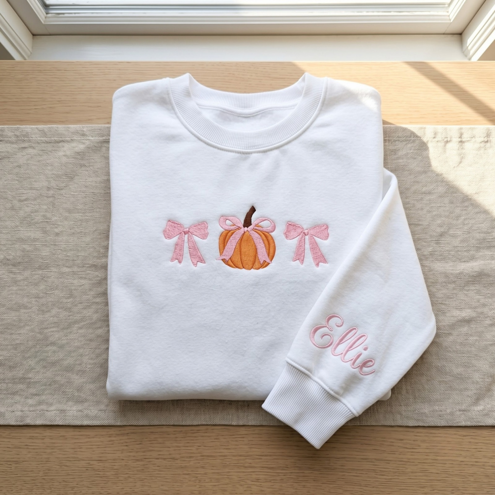 Personalized Fall Pumpkin Pink Coquette Bows Minimalist embroidered sweatshirt — front view