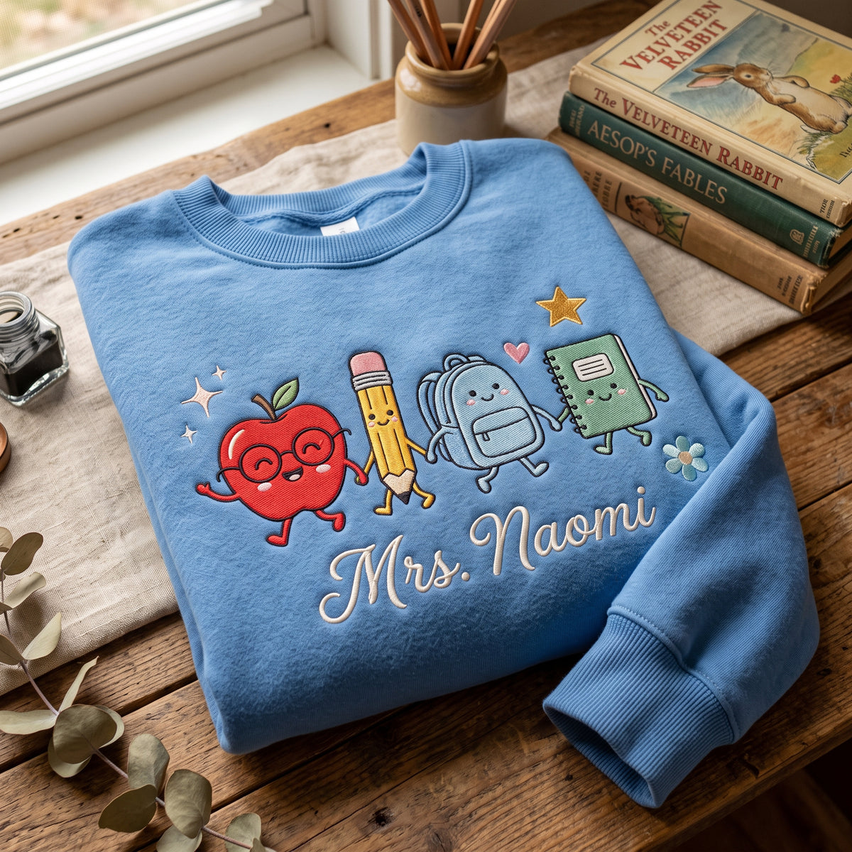 Personalized Teacher Name School Supplies Friends Holding Hands Apple Pencil Backpack embroidered sweatshirt — front view