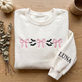 Personalized Halloween Pink Coquette Bows and Bats Minimalist embroidered sweatshirt — front view