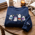 Personalized Halloween Four Ghosts Reading Books Stack embroidered sweatshirt — front view