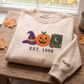 Personalized Witch Hat Jack O Lantern Spell Book EST Year embroidered sweatshirt — front view